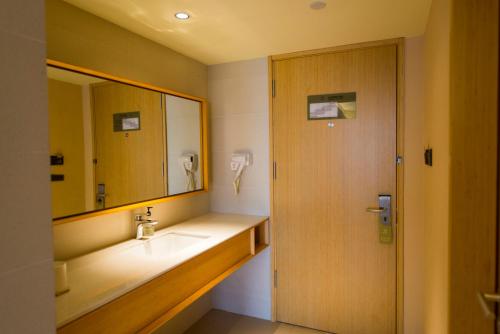 Imagen de la habitación del Hotel Ji Shanghai Jiangqiao Wanda Plaza. Foto 6