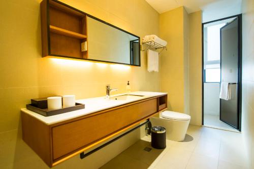 Imagen de la habitación del Hotel Ji Shanghai Kangqiao Xiupu Road. Foto 6