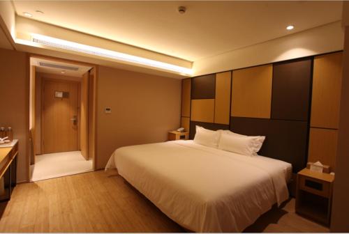 Imagen de la habitación del Hotel Ji Shanghai Kangqiao Xiuyan Road. Foto 6