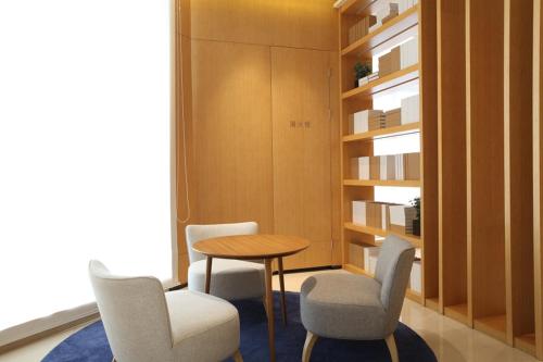 Imagen de la habitación del Hotel Ji Shanghai Kangqiao Xiuyan Road. Foto 9