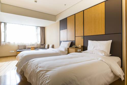 Imagen de la habitación del Hotel Ji Shanghai Stadium. Foto 1