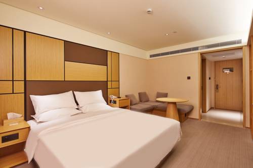 Imagen de la habitación del Hotel Ji Shanghai Stadium. Foto 4