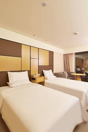 Imagen de la habitación del Hotel Ji Shanghai Stadium. Foto 5