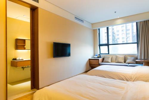 Imagen de la habitación del Hotel Ji Taiyuan Hi-tech Zone. Foto 7