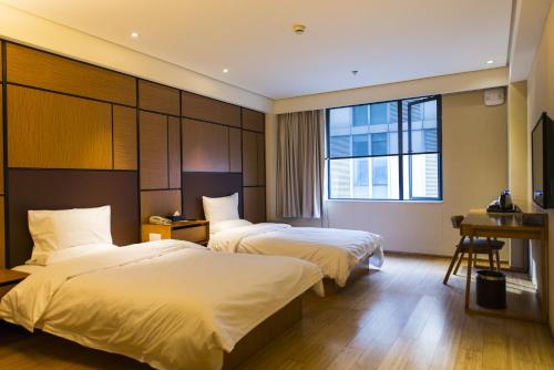 Imagen de la habitación del Hotel Ji Taiyuan South Railway Station. Foto 6