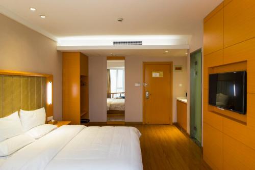 Imagen de la habitación del Hotel Ji Tianjin Huayuan. Foto 8