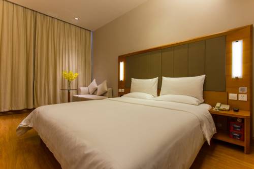 Imagen de la habitación del Hotel Ji Wuhan Guanggu Plaza. Foto 5