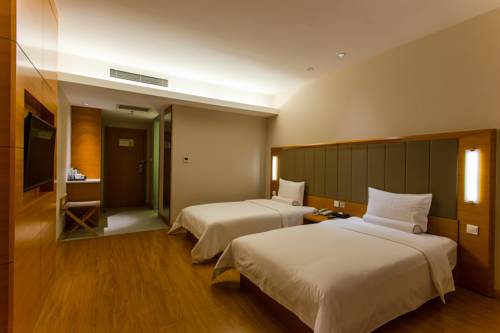 Imagen de la habitación del Hotel Ji Wuhan Guanggu Plaza. Foto 6