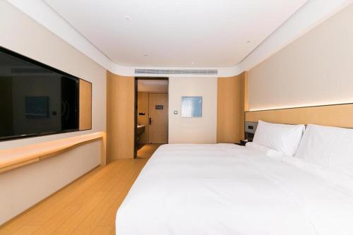 Imagen general del Hotel Ji Wuxi Railway Station. Foto 8