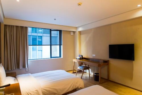 Imagen general del Hotel Ji Zhenjiang Railway Station. Foto 4