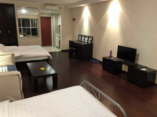 Imagen de la habitación del Hotel Jia Zhao Ye Sunny Seaview Apartment. Foto 17