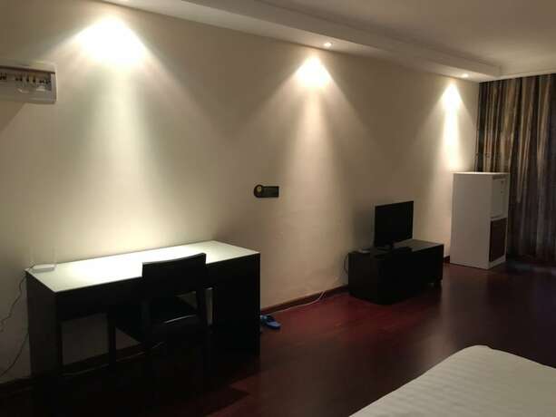 Imagen de la habitación del Hotel Jia Zhao Ye Sunny Seaview Apartment. Foto 18
