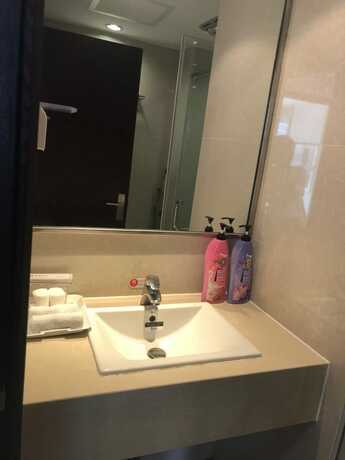 Imagen de la habitación del Hotel Jia Zhao Ye Sunny Seaview Apartment. Foto 20