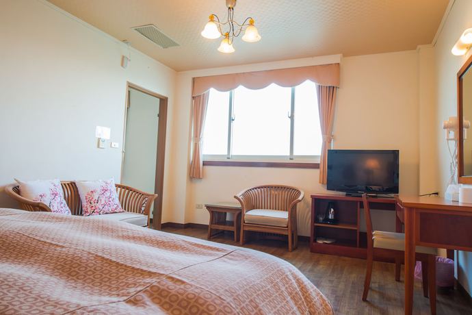 Imagen de la habitación del Hotel JiaHua. Foto 2