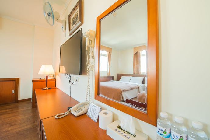 Imagen de la habitación del Hotel JiaHua. Foto 3