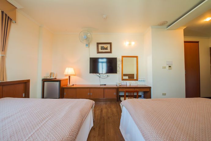 Imagen de la habitación del Hotel JiaHua. Foto 5