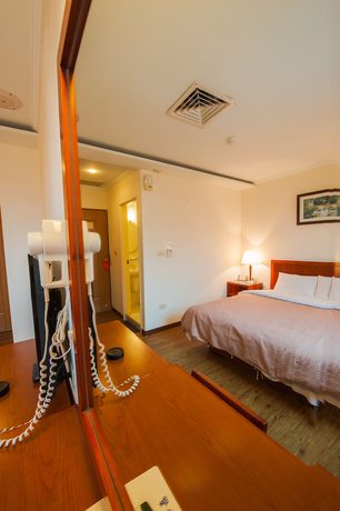 Imagen de la habitación del Hotel JiaHua. Foto 6