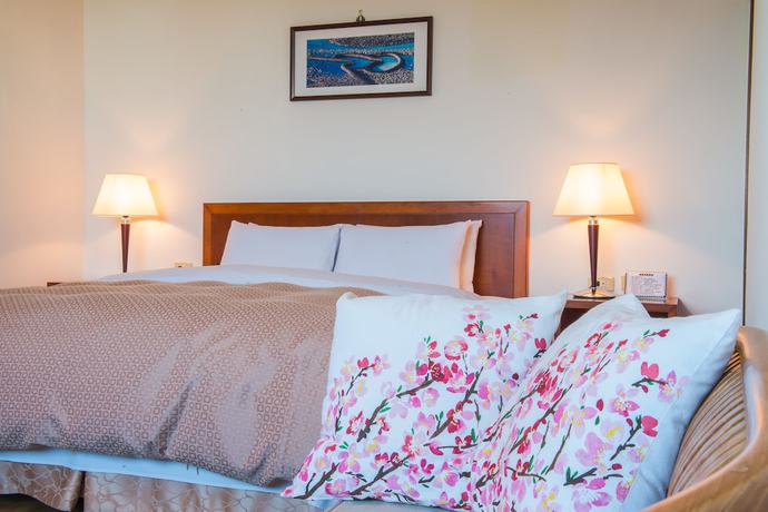 Imagen de la habitación del Hotel JiaHua. Foto 7