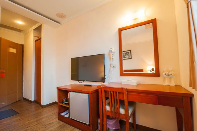 Imagen de la habitación del Hotel JiaHua. Foto 8