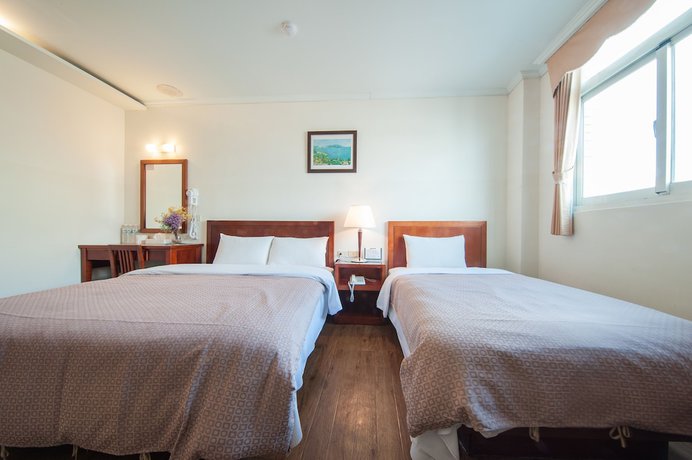 Imagen de la habitación del Hotel JiaHua. Foto 11