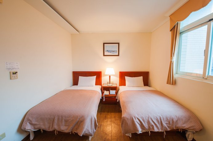 Imagen de la habitación del Hotel JiaHua. Foto 12