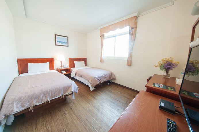 Imagen de la habitación del Hotel JiaHua. Foto 13