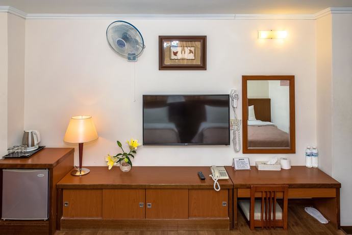 Imagen de la habitación del Hotel JiaHua. Foto 14