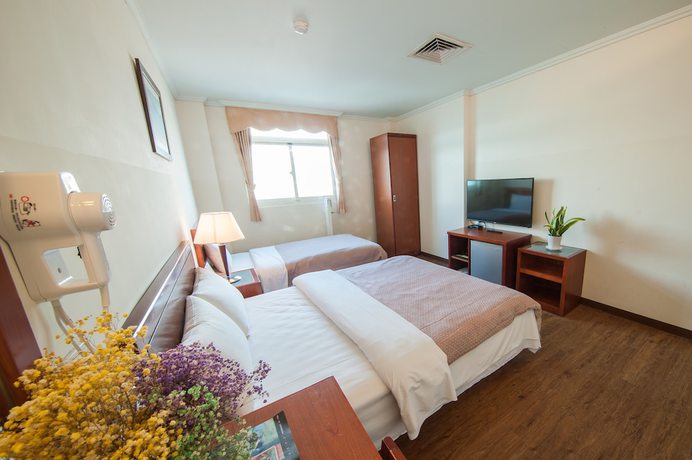 Imagen de la habitación del Hotel JiaHua. Foto 15