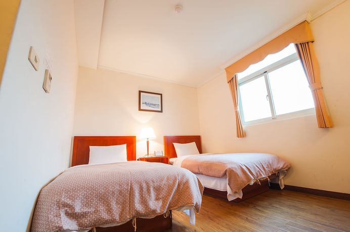 Imagen de la habitación del Hotel JiaHua. Foto 16