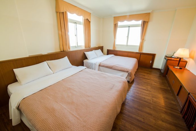 Imagen de la habitación del Hotel JiaHua. Foto 20