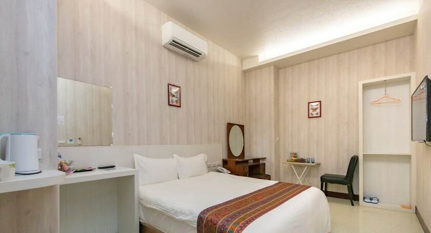 Imagen de la habitación del Hotel Jia-Jia Business. Foto 13