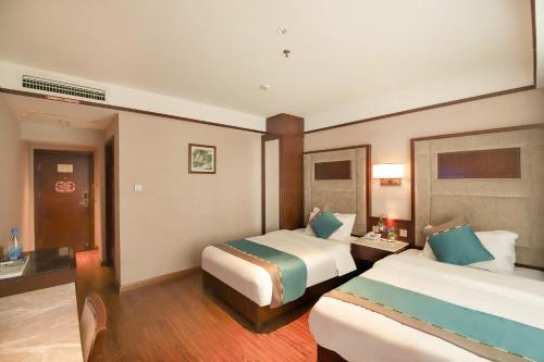 Imagen de la habitación del Hotel Jiahua - Wanzai Ancient City. Foto 11