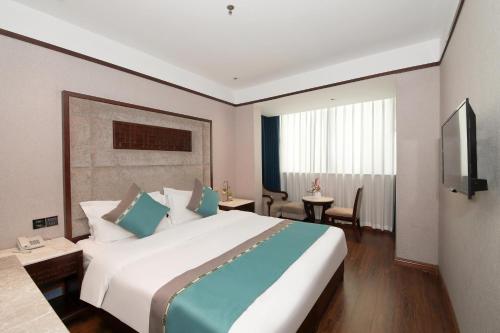 Imagen general del Hotel Jiahua - Wanzai Ancient City. Foto 6