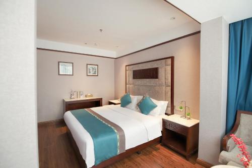 Imagen de la habitación del Hotel Jiahua - Wanzai Ancient City. Foto 13