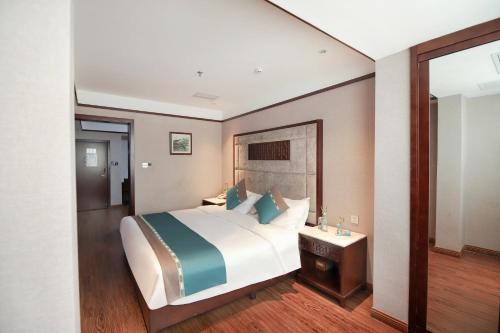 Imagen de la habitación del Hotel Jiahua - Wanzai Ancient City. Foto 14