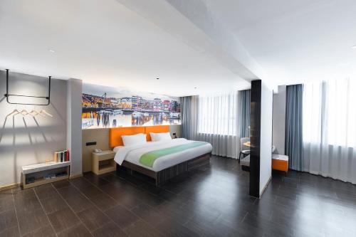 Imagen de la habitación del Hotel Jiahua - Wanzai Ancient City. Foto 17