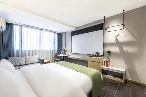 Imagen de la habitación del Hotel Jiahua - Wanzai Ancient City. Foto 19