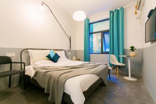 Imagen de la habitación del Hotel Jiajia_home+. Foto 6