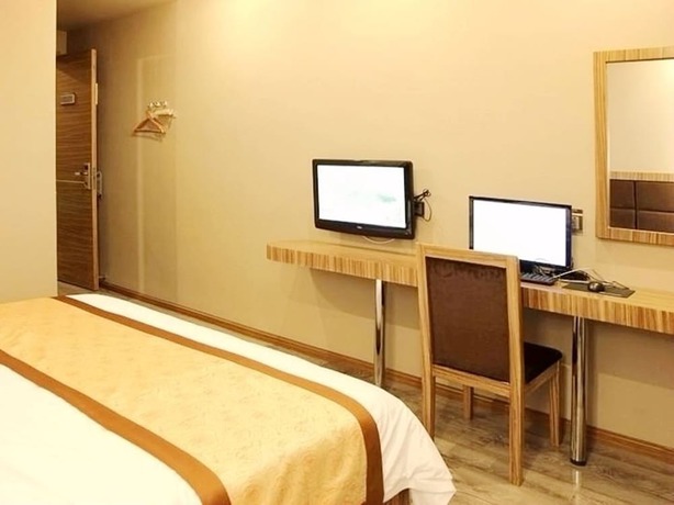 Imagen de la habitación del Hotel Jiake - Kunming. Foto 5