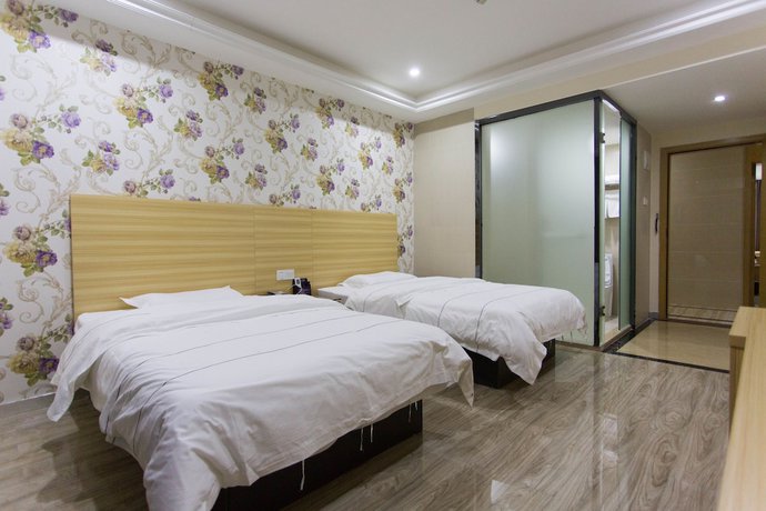 Imagen de la habitación del Hotel Jiamei. Foto 2