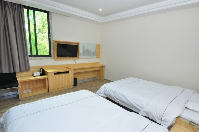 Imagen de la habitación del Hotel Jiamei. Foto 4
