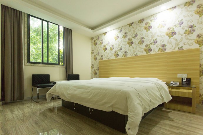 Imagen de la habitación del Hotel Jiamei. Foto 5