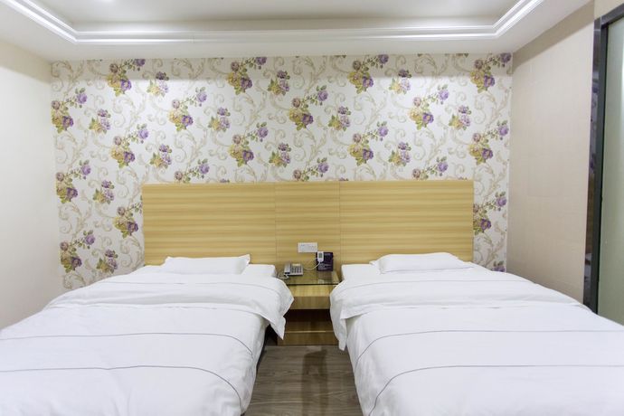 Imagen de la habitación del Hotel Jiamei. Foto 6