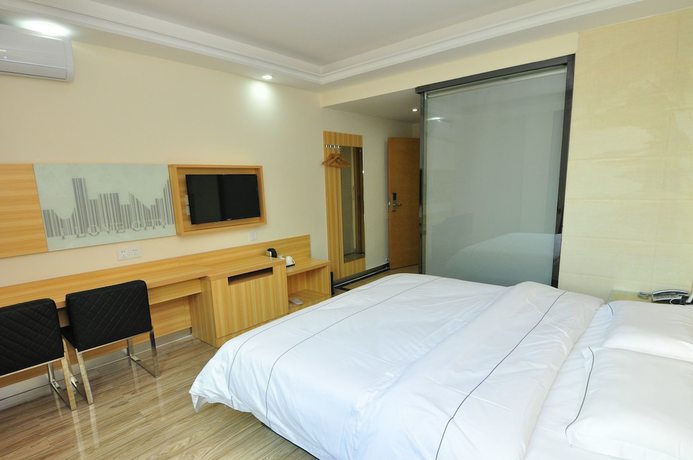 Imagen de la habitación del Hotel Jiamei. Foto 9
