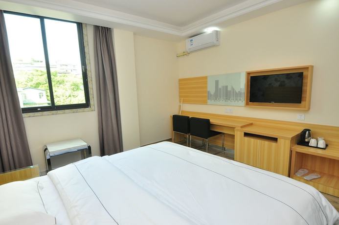 Imagen de la habitación del Hotel Jiamei. Foto 10