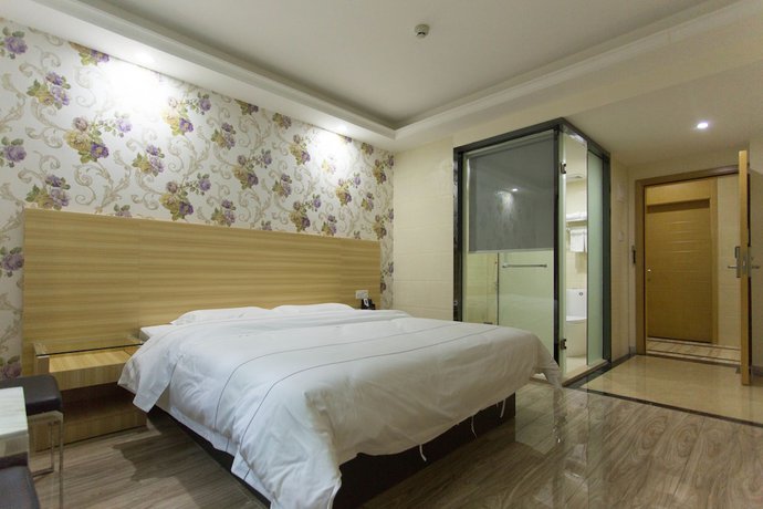 Imagen de la habitación del Hotel Jiamei. Foto 11