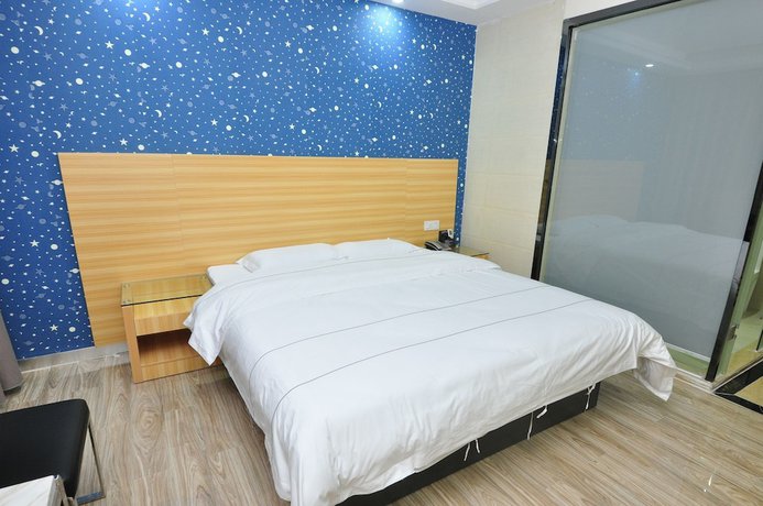 Imagen de la habitación del Hotel Jiamei. Foto 13
