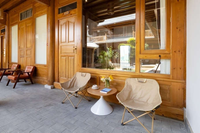 Imagen de la habitación del Hotel Jian Chuan Sha Xi Sha Ping NO.2Courtyard. Foto 4
