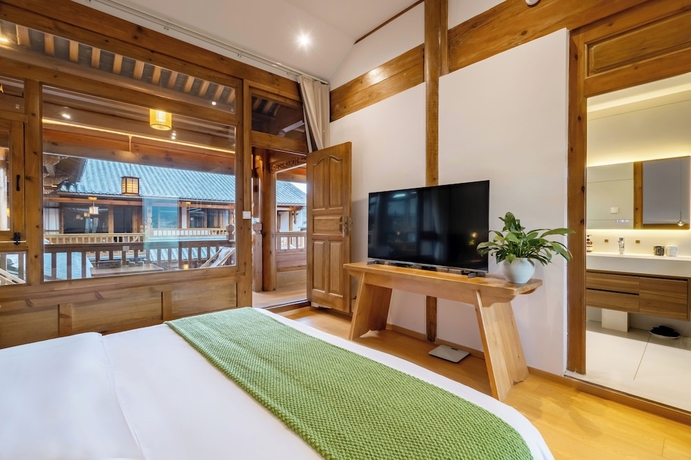 Imagen de la habitación del Hotel Jian Chuan Sha Xi Sha Ping NO.2Courtyard. Foto 6