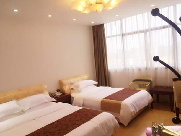 Imagen de la habitación del Hotel Jian Guo Grand. Foto 6